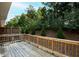 Wooden back deck offers scenic wooded views at 2539 Hedgeway Cir, Kennesaw, GA 30144