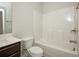 Bathroom features tub with shower, a white vanity, and tile flooring at 2539 Hedgeway Cir, Kennesaw, GA 30144