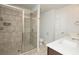 Bathroom boasts a tiled shower, modern fixtures, and a double vanity at 2539 Hedgeway Cir, Kennesaw, GA 30144