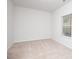 Cozy bedroom featuring neutral carpet and a window for natural light at 2539 Hedgeway Cir, Kennesaw, GA 30144