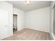 Bedroom featuring neutral carpet, a ceiling light, and an adjoining bathroom at 2539 Hedgeway Cir, Kennesaw, GA 30144