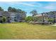Community featuring townhomes, green space, and gazebo at 2539 Hedgeway Cir, Kennesaw, GA 30144