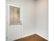 Exterior door with window and horizontal blinds, showing the back yard at 2539 Hedgeway Cir, Kennesaw, GA 30144