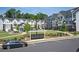 Beautiful view of townhomes showcasing manicured landscaping, community mailboxes, and convenient parking at 2539 Hedgeway Cir, Kennesaw, GA 30144