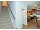 Open staircase leads to the kitchen with stainless steel appliances at 2539 Hedgeway Cir, Kennesaw, GA 30144