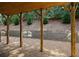 Back patio with rock ground cover and wood support structure at 2539 Hedgeway Cir, Kennesaw, GA 30144