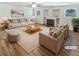 Virtually staged living room featuring a fireplace and comfortable seating at 7527 Stonebridge Bay Ct, Stone Mountain, GA 30087