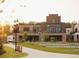 The Club at the Tin Cup Grill, a brick building offers a restaurant and gathering space for residents at 626 Skytop Dr # 159, Cumming, GA 30040