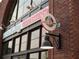 Charming brick building with Juke N' Jive Creamery signage, inviting residents for sweet treats at 626 Skytop Dr # 159, Cumming, GA 30040