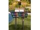 Outdoor musical instrument installation with colorful bars on a grassy area at 626 Skytop Dr # 159, Cumming, GA 30040