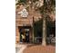 Atlanta Bread restaurant exterior featuring an inviting entrance and rustic wood and greenery accents at 626 Skytop Dr # 159, Cumming, GA 30040