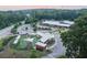 Overhead view of a park with playground, trees, and walking paths at 629 Silva St # 128, Cumming, GA 30040