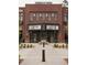 Cumming City Center brick building featuring retail spaces and event marquees at 629 Silva St # 128, Cumming, GA 30040