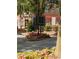 Directory sign surrounded by flowers, and landscaping on a sunny day at 629 Silva St # 128, Cumming, GA 30040