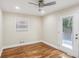 Bedroom featuring hardwood floors and an exterior door leading to a deck space at 2121 Arlington Ne Ave, Atlanta, GA 30324