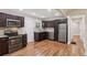Open kitchen design with stainless steel appliances, granite countertops, and hardwood floors at 2121 Arlington Ne Ave, Atlanta, GA 30324