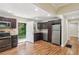 Kitchen with stainless steel appliances, hardwood floors, and an open doorway to the backyard at 2121 Arlington Ne Ave, Atlanta, GA 30324