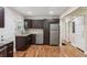 Kitchen boasting sleek countertops, stainless appliances, and hardwood floors throughout at 2121 Arlington Ne Ave, Atlanta, GA 30324