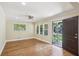 Bright, open space with hardwood floors, neutral walls, and a back porch entrance at 2121 Arlington Ne Ave, Atlanta, GA 30324