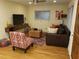 Comfortable living room with hardwood floors, colorful decor, and natural light at 2121 Arlington Ne Ave, Atlanta, GA 30324