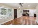 Bright living space featuring hardwood floors, dark trim and an eat-in kitchen at 2121 Arlington Ne Ave, Atlanta, GA 30324