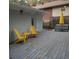 Outdoor patio space with Adirondack chairs, table, and umbrella, perfect for relaxing outdoors at 2121 Arlington Ne Ave, Atlanta, GA 30324
