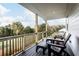 Relaxing deck with wooden chairs and wooded views at 4212 Adler Cir, Buford, GA 30519