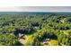 Wide shot of house and surrounding area at 2269 E Cherokee Dr, Woodstock, GA 30188