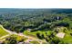 Aerial view showing house nestled in wooded area at 2269 E Cherokee Dr, Woodstock, GA 30188