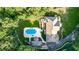 Home with pool and patio, surrounded by trees at 2269 E Cherokee Dr, Woodstock, GA 30188
