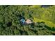 House with pool, surrounded by lush green trees at 2269 E Cherokee Dr, Woodstock, GA 30188