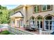 Spacious deck with seating area, overlooks private backyard at 2269 E Cherokee Dr, Woodstock, GA 30188
