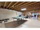 Unfinished basement with exposed beams, ping pong table, and plenty of space at 2269 E Cherokee Dr, Woodstock, GA 30188
