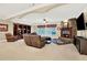 Finished basement with a cozy fireplace and plenty of space for entertaining at 2269 E Cherokee Dr, Woodstock, GA 30188