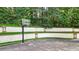 Private backyard basketball court with retaining wall at 2269 E Cherokee Dr, Woodstock, GA 30188
