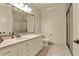 Elegant bathroom with a double vanity, large mirror, and a walk-in shower at 2269 E Cherokee Dr, Woodstock, GA 30188