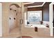 Spa-like bathroom featuring a large shower and a luxurious soaking tub at 2269 E Cherokee Dr, Woodstock, GA 30188