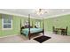 Spacious bedroom with a large bed, plenty of natural light, and a sitting area at 2269 E Cherokee Dr, Woodstock, GA 30188