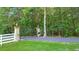 Private entrance with black wrought iron gate at 2269 E Cherokee Dr, Woodstock, GA 30188