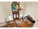 Two story entry with hardwood floors and chandelier at 2269 E Cherokee Dr, Woodstock, GA 30188