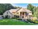 Two-story house with stone accents and a lush green lawn at 2269 E Cherokee Dr, Woodstock, GA 30188