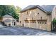 Three-car garage with additional detached structure at 2269 E Cherokee Dr, Woodstock, GA 30188