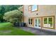 House back exterior with French doors and AC units at 2269 E Cherokee Dr, Woodstock, GA 30188