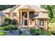 Brick and stone two-story house with entry porch at 2269 E Cherokee Dr, Woodstock, GA 30188