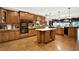 Spacious kitchen with large island, granite countertops, and ample cabinet space at 2269 E Cherokee Dr, Woodstock, GA 30188