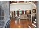 Open living area with hardwood floors, fireplace, staircase at 2269 E Cherokee Dr, Woodstock, GA 30188