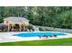 Large pool with outdoor kitchen and seating at 2269 E Cherokee Dr, Woodstock, GA 30188