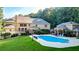 Luxury home with a large pool and deck at 2269 E Cherokee Dr, Woodstock, GA 30188
