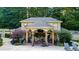 Outdoor kitchen and bar area with pool views at 2269 E Cherokee Dr, Woodstock, GA 30188