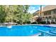 Refreshing blue pool with plenty of lounge chairs for relaxation at 2269 E Cherokee Dr, Woodstock, GA 30188